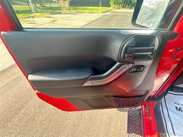 Photo of 2014 Flame Red Clearcoat Jeep Wrangler Unlimited