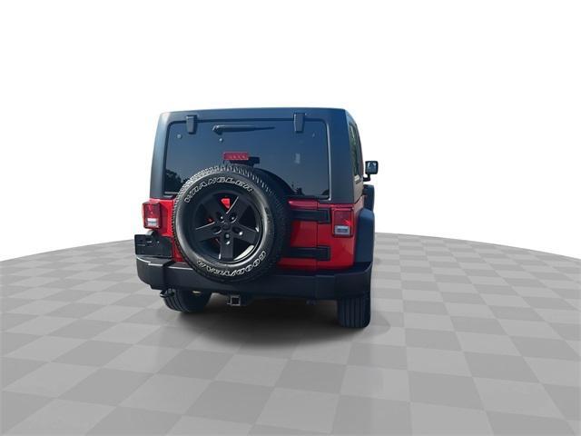 Photo of 2014 Flame Red Clearcoat Jeep Wrangler Unlimited