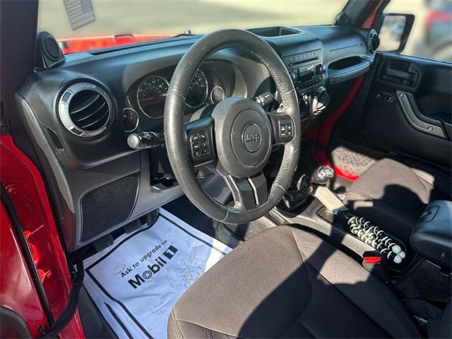 Photo of 2014 Flame Red Clearcoat Jeep Wrangler Unlimited
