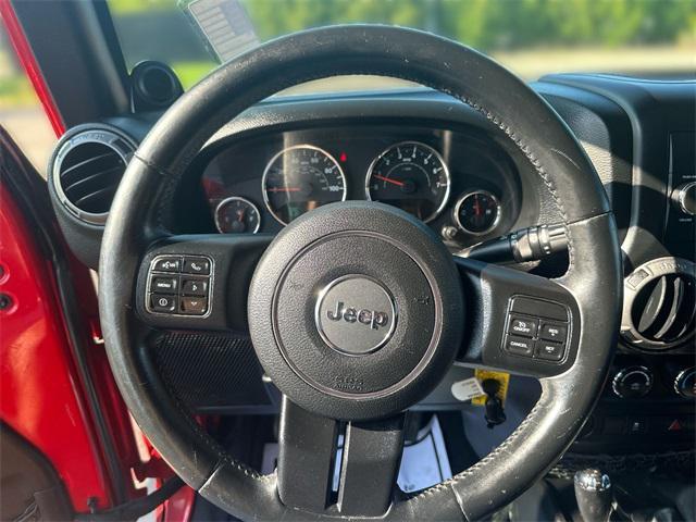 Photo of 2014 Flame Red Clearcoat Jeep Wrangler Unlimited