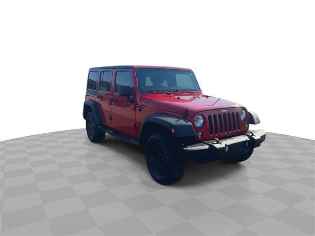 Photo of 2014 Flame Red Clearcoat Jeep Wrangler Unlimited