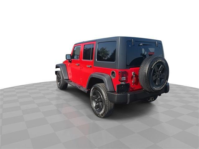 Photo of 2014 Flame Red Clearcoat Jeep Wrangler Unlimited