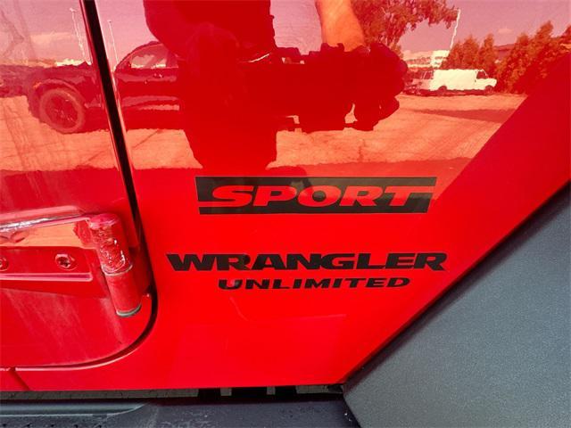 Photo of 2014 Flame Red Clearcoat Jeep Wrangler Unlimited