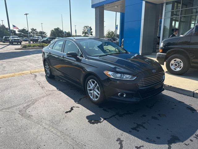 Photo of 2014 Tuxedo Black Metallic Ford Fusion