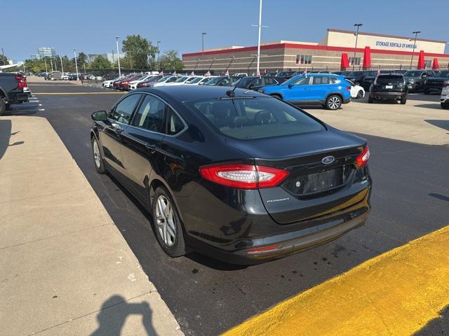 Photo of 2014 Tuxedo Black Metallic Ford Fusion