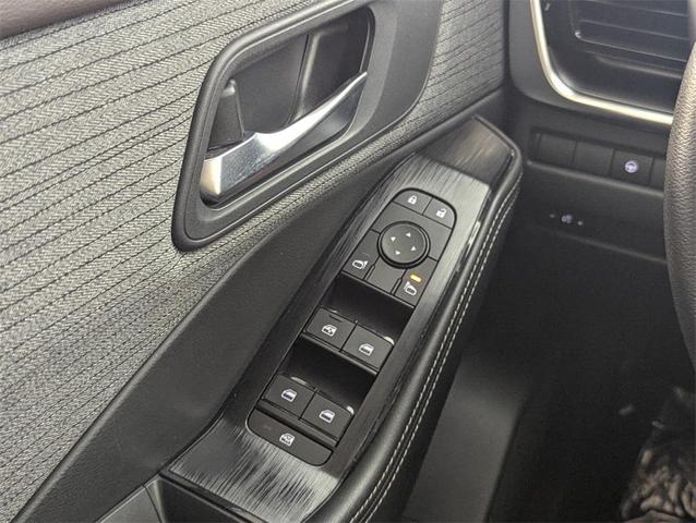 Photo of 2023 Pearl White Tricoat Nissan Rogue