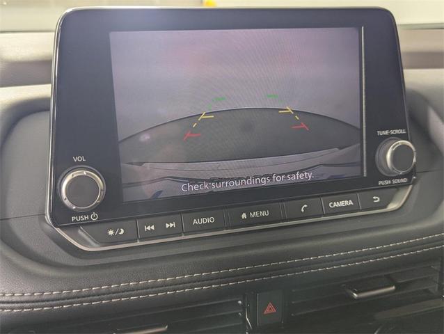 Photo of 2023 Pearl White Tricoat Nissan Rogue
