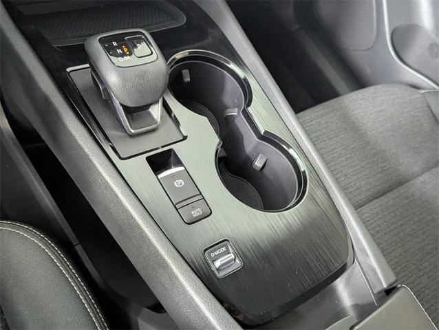 Photo of 2023 Pearl White Tricoat Nissan Rogue