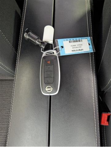 Photo of 2023 Pearl White Tricoat Nissan Rogue