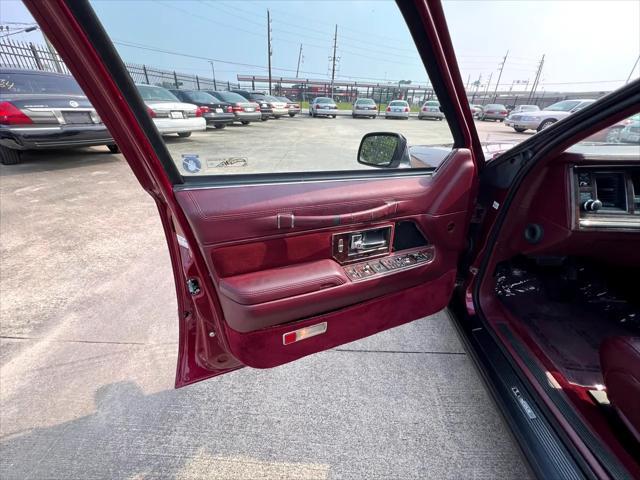 Photo of 1990 Burgundy Lincoln Town Car