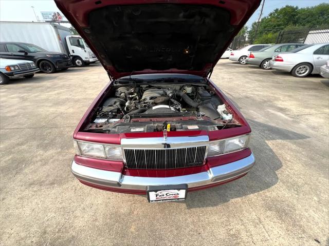 Photo of 1990 Burgundy Lincoln Town Car