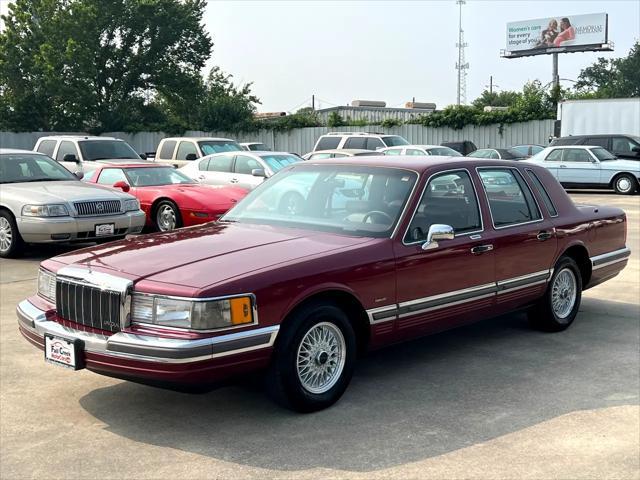 Photo of 1990 Burgundy Lincoln Town Car
