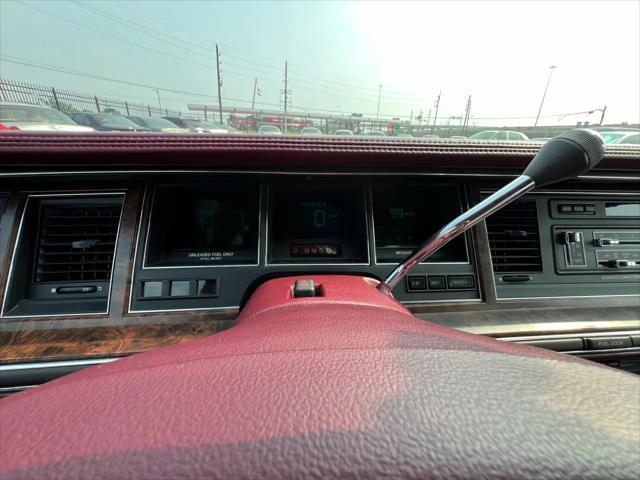Photo of 1990 Burgundy Lincoln Town Car
