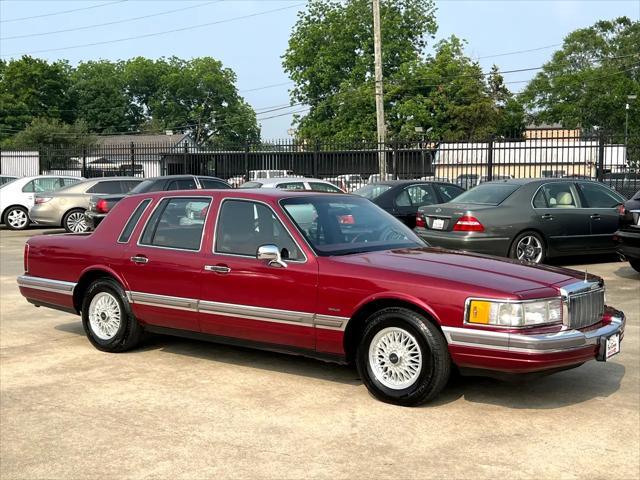 Photo of 1990 Burgundy Lincoln Town Car