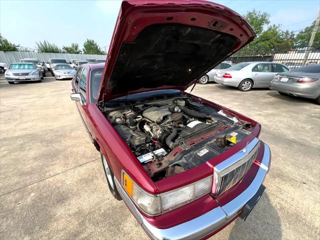 Photo of 1990 Burgundy Lincoln Town Car