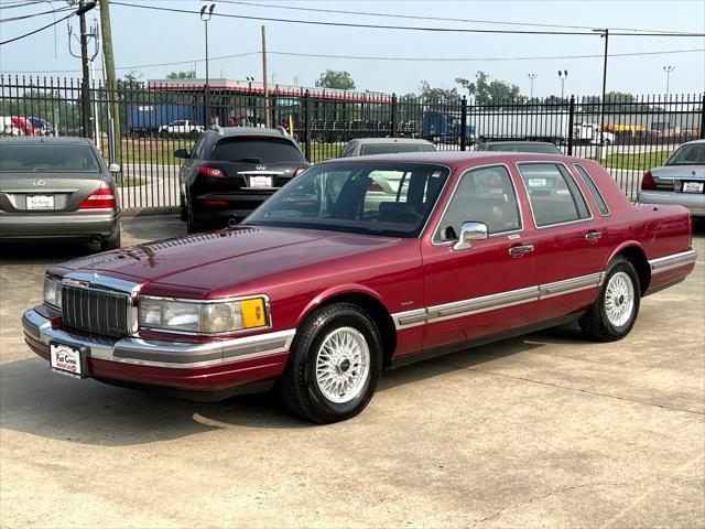 Photo of 1990 Burgundy Lincoln Town Car