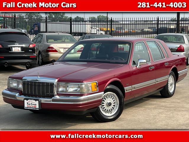 Photo of 1990 Burgundy Lincoln Town Car