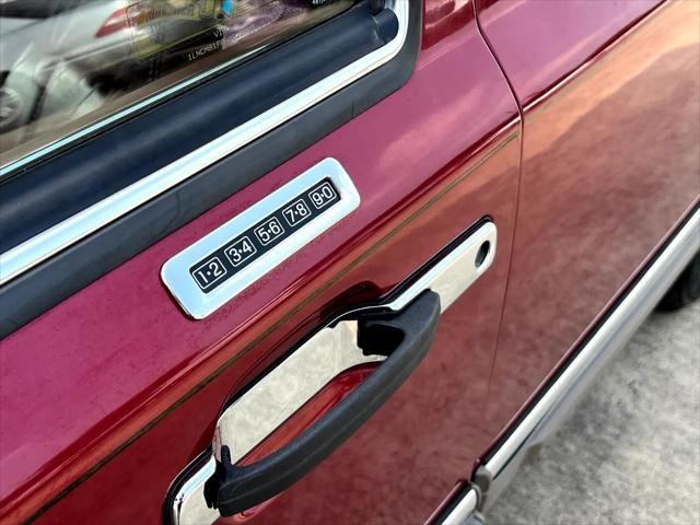 Photo of 1990 Burgundy Lincoln Town Car