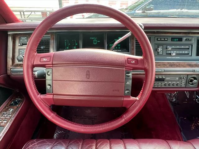 Photo of 1990 Burgundy Lincoln Town Car