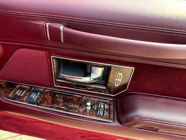 Photo of 1990 Burgundy Lincoln Town Car