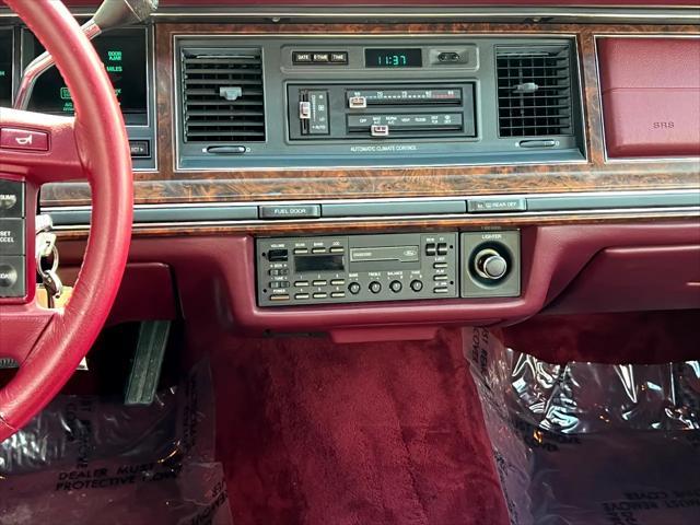Photo of 1990 Burgundy Lincoln Town Car