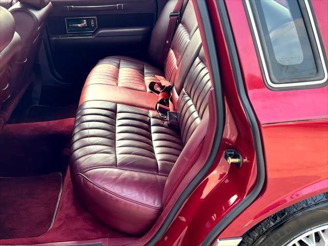Photo of 1990 Burgundy Lincoln Town Car