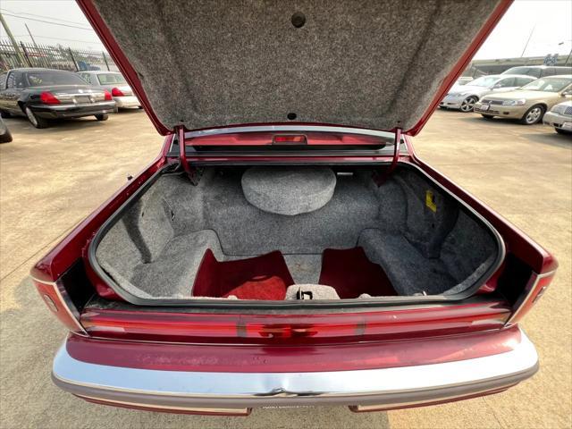 Photo of 1990 Burgundy Lincoln Town Car
