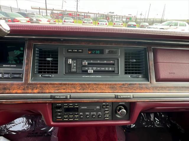 Photo of 1990 Burgundy Lincoln Town Car