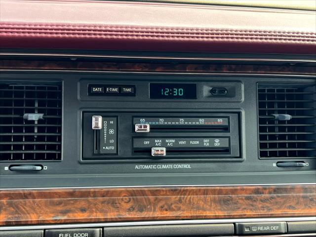 Photo of 1990 Burgundy Lincoln Town Car