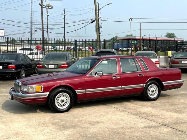 Photo of 1990 Burgundy Lincoln Town Car