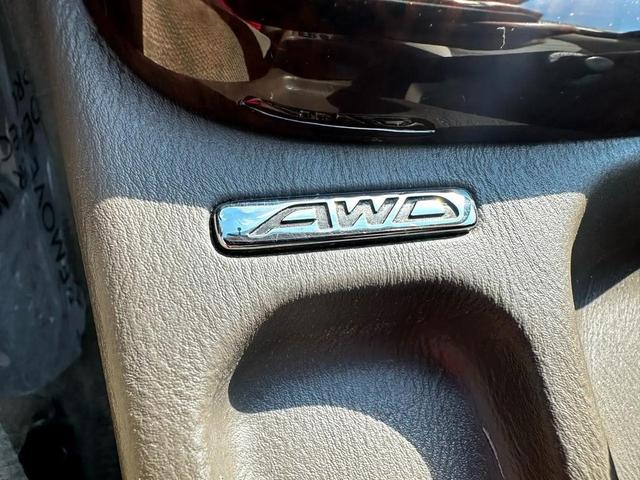 Photo of 2001 Winestone Pearl/Titanium Pearl Subaru Outback