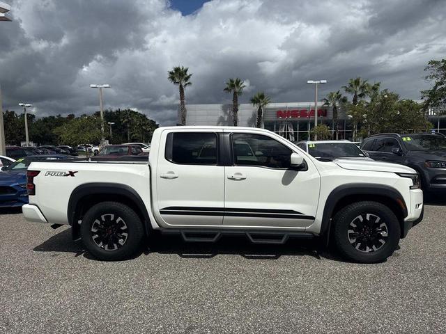 Photo of 2022 Glacier White Nissan Frontier