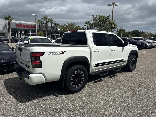 Photo of 2022 Glacier White Nissan Frontier