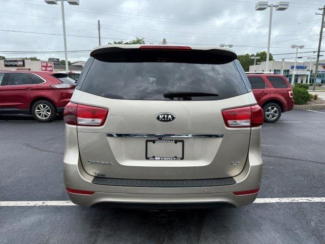 Photo of 2016 Beechwood Pearl Metallic Kia Sedona