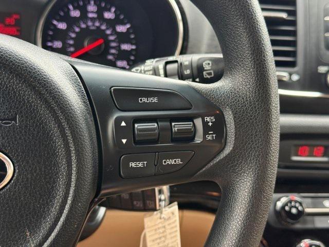 Photo of 2016 Beechwood Pearl Metallic Kia Sedona