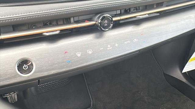 Photo of 2025 Deep Ocean Blue Pearl/Black Diamond Pearl Nissan ARIYA