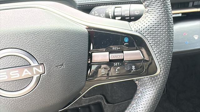 Photo of 2025 Deep Ocean Blue Pearl/Black Diamond Pearl Nissan ARIYA