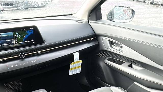 Photo of 2025 Deep Ocean Blue Pearl/Black Diamond Pearl Nissan ARIYA