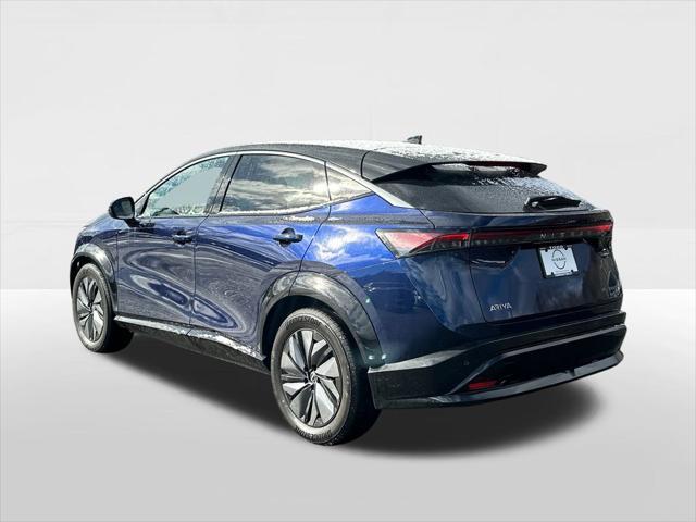 Photo of 2025 Deep Ocean Blue Pearl/Black Diamond Pearl Nissan ARIYA