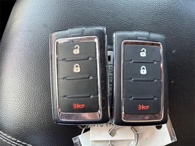 Photo of 2024 Diamond Black Crystal Pearlcoat Jeep Grand Cherokee L