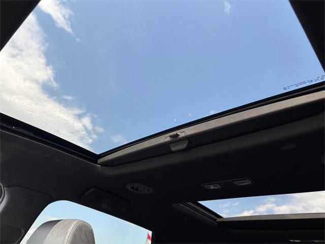 Photo of 2024 Cherry Red Tintcoat Buick Enclave