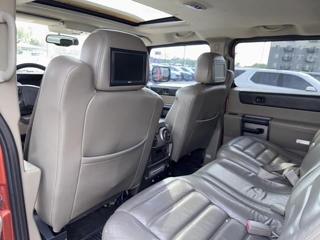 Photo of 2003 Sunset Orange Metallic Hummer H2