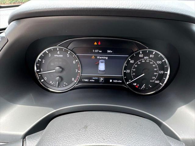 Photo of 2024 Moonstone White INFINITI QX80