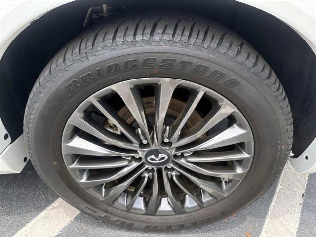 Photo of 2024 Moonstone White INFINITI QX80