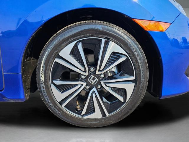 Photo of 2018 Aegean Blue Metallic Honda Civic