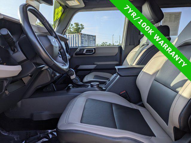 Photo of 2022 CYBER ORANGE MET TRI-COAT Ford Bronco