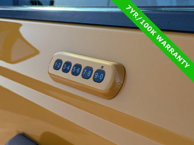 Photo of 2022 CYBER ORANGE MET TRI-COAT Ford Bronco