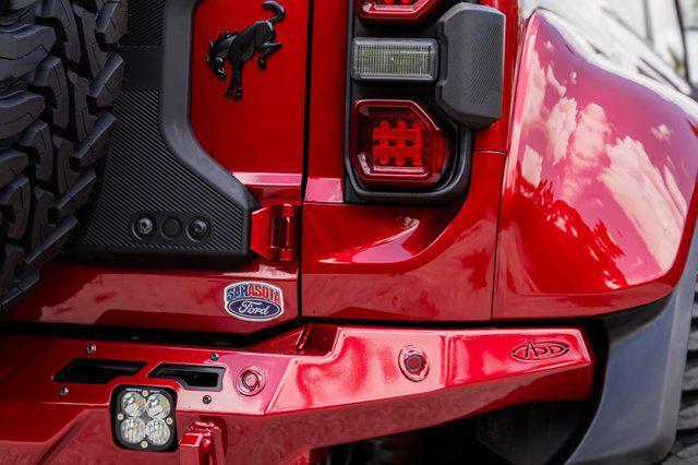 Photo of 2025 Ruby Red Metallic Tinted Clearcoat Ford Bronco