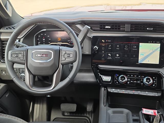 Photo of 2025 Volcanic Red Tintcoat GMC Sierra 2500