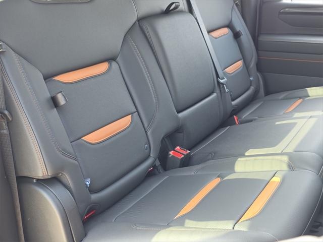 Photo of 2025 Volcanic Red Tintcoat GMC Sierra 2500
